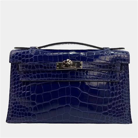 Pochette en alligator Kelly to go .